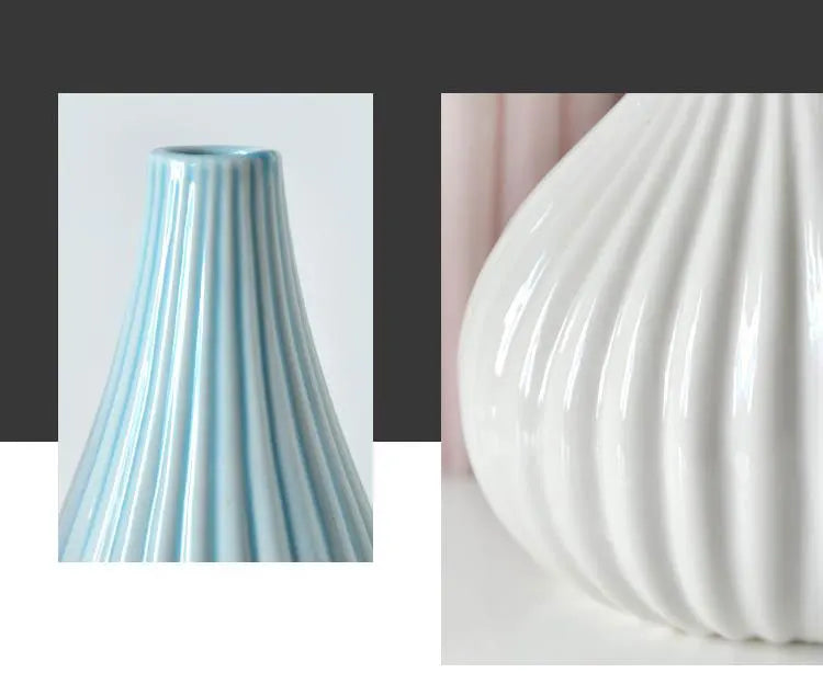 A white ceramic vase with vertical ribbed texture, shown in a close-up view.