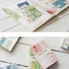 A collection of decorative memo pads and cards in various patterns and colors for a journal paper pack.