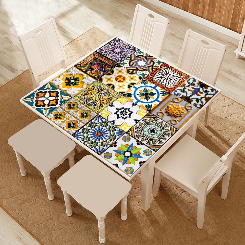 A wooden table displays a colorful mosaic of retro Moroccan tile stickers on a light-colored rug.