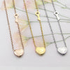 Three gold and silver heart lock key pendant necklaces displayed on a white background.