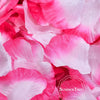 Close-up of vibrant pink and white silk rose petals used for weddings and events.