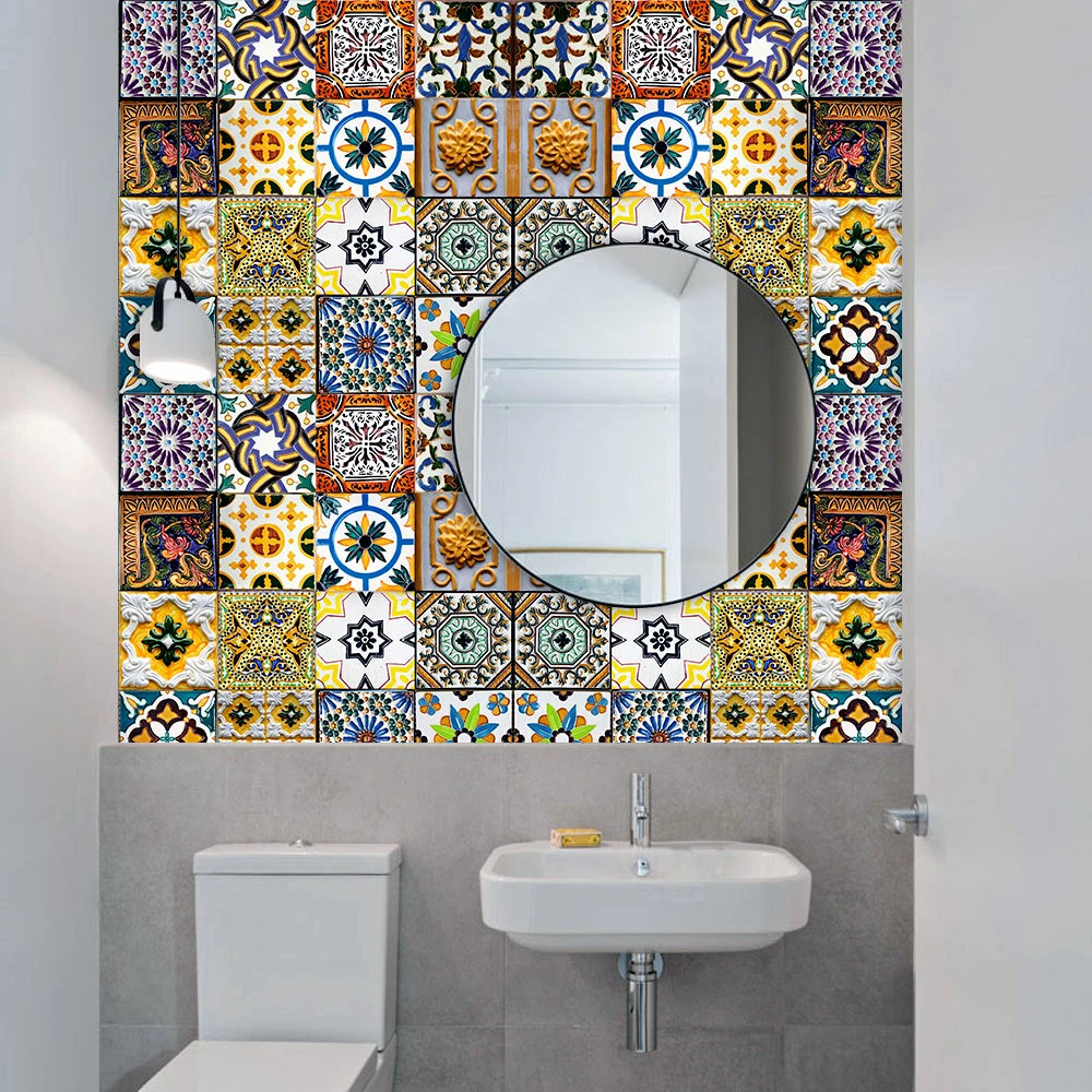 A bathroom wall decorated with colorful retro Moroccan tile stickers surrounding a circular mirror above a sink and toilet.