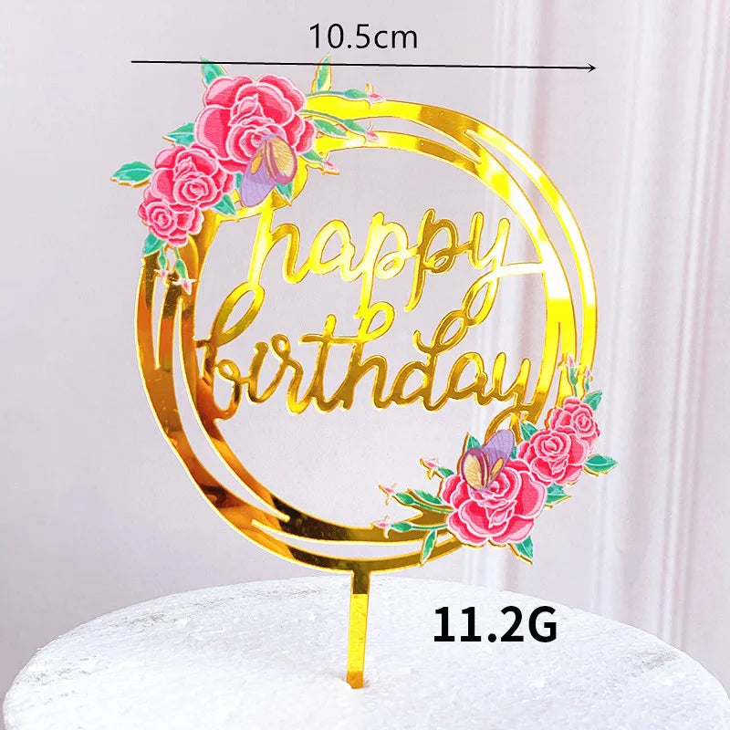 Gold acrylic happy birthday cake topper featuring pink roses and green leaves