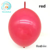 A single bright red latex balloon is shown against a white background.