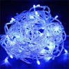 A tangled bundle of bright blue LED string lights used for holiday decoration.