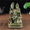 Hand-finished resin Hindu and Buddhist deity figurine of a seated figure in gold color