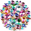 A collection of iridescent glass rhinestones in various colors and shapes set in silver claws.