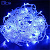 A tangled bundle of blue LED string lights used for holiday decoration.