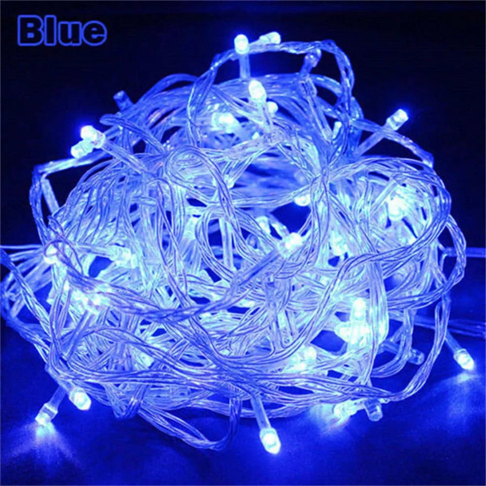 A tangled bundle of blue LED string lights used for holiday decoration.