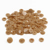 A pile of assorted tan and beige snap buttons, measuring 12mm and 10.5mm, for crafting.