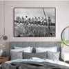 Black and white canvas wall art depicting a group of people overlooking the New York City skyline.