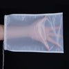 A clear nylon filter bag is shown with a hand inside, demonstrating its use for filtering liquids.