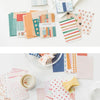 A collection of colorful decorative memo pads and cards in various patterns and colors.