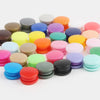 Assorted snap buttons in various colors and sizes for crafting