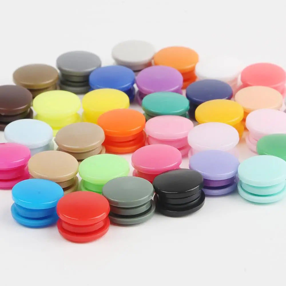 Assorted snap buttons in various colors and sizes for crafting