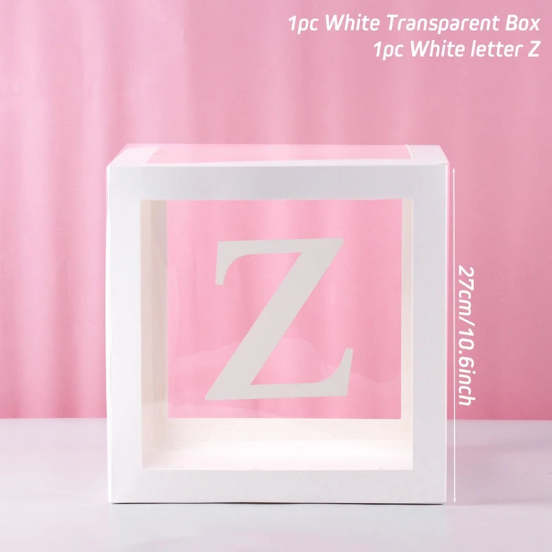 A white transparent box with a letter Z inside, used for birthday and baby shower decorations.