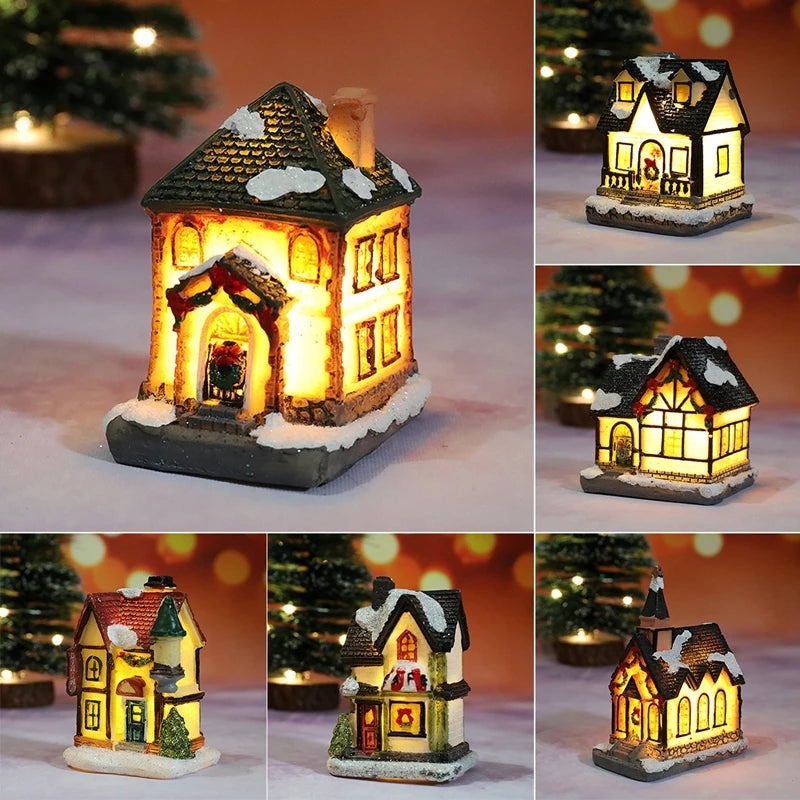 A festive Christmas house night light with a warm LED glow, featuring an illuminated wooden structure covered in snow.