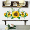 Wooden tray with white plates and a floral wreath design featuring yellow sunflowers and green leaves