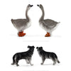 A pair of realistic farm animal figurines, a turkey and a goose, displayed against a white background.