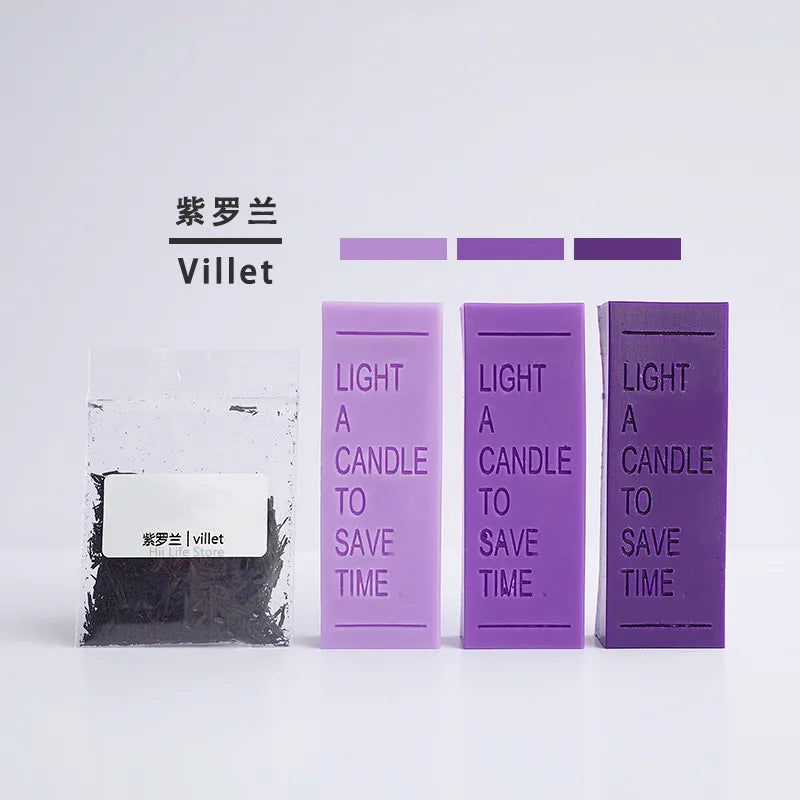 A set of violet colored candle dye colorants labeled Violet from Villet, displayed in glass jars.