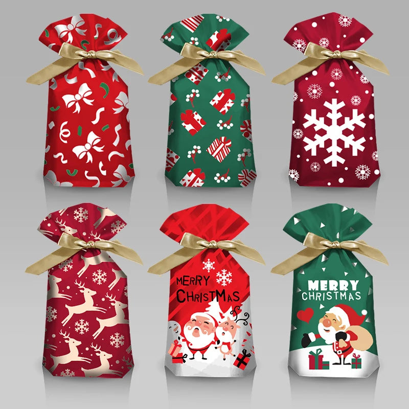 Four festive Christmas drawstring gift bags featuring snowflake, reindeer, and Santa designs in red, green, and white.