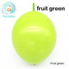 A bright lime green latex balloon is shown against a white background.