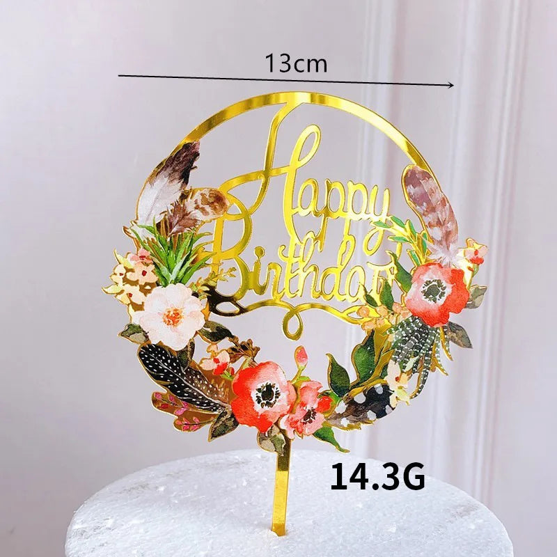 Rose gold acrylic happy birthday cake topper featuring floral and feather accents