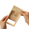 A wooden photo frame set with a vintage design featuring a bicycle silhouette.