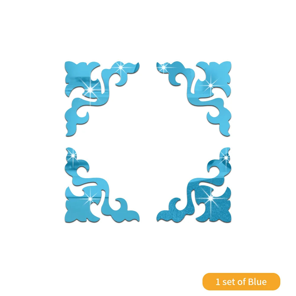 A set of blue 3D acrylic mirror wall stickers featuring decorative swirling designs.