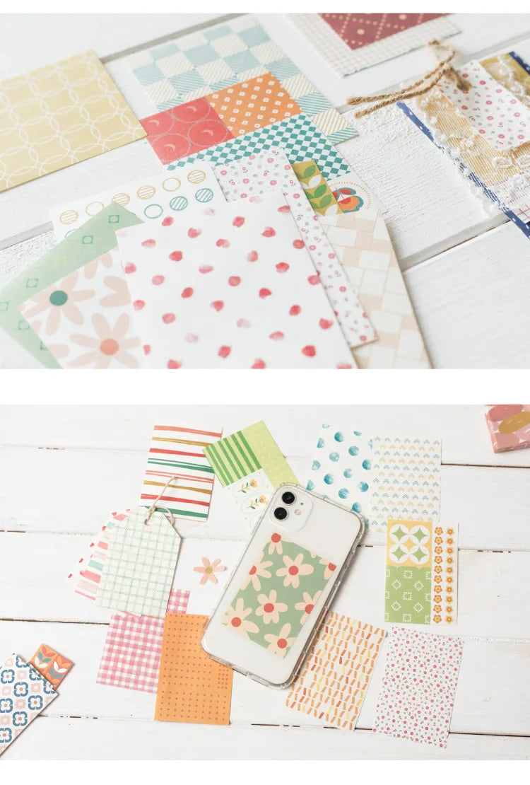 A collection of decorative paper, including memo pads and cards in various patterns and colors.