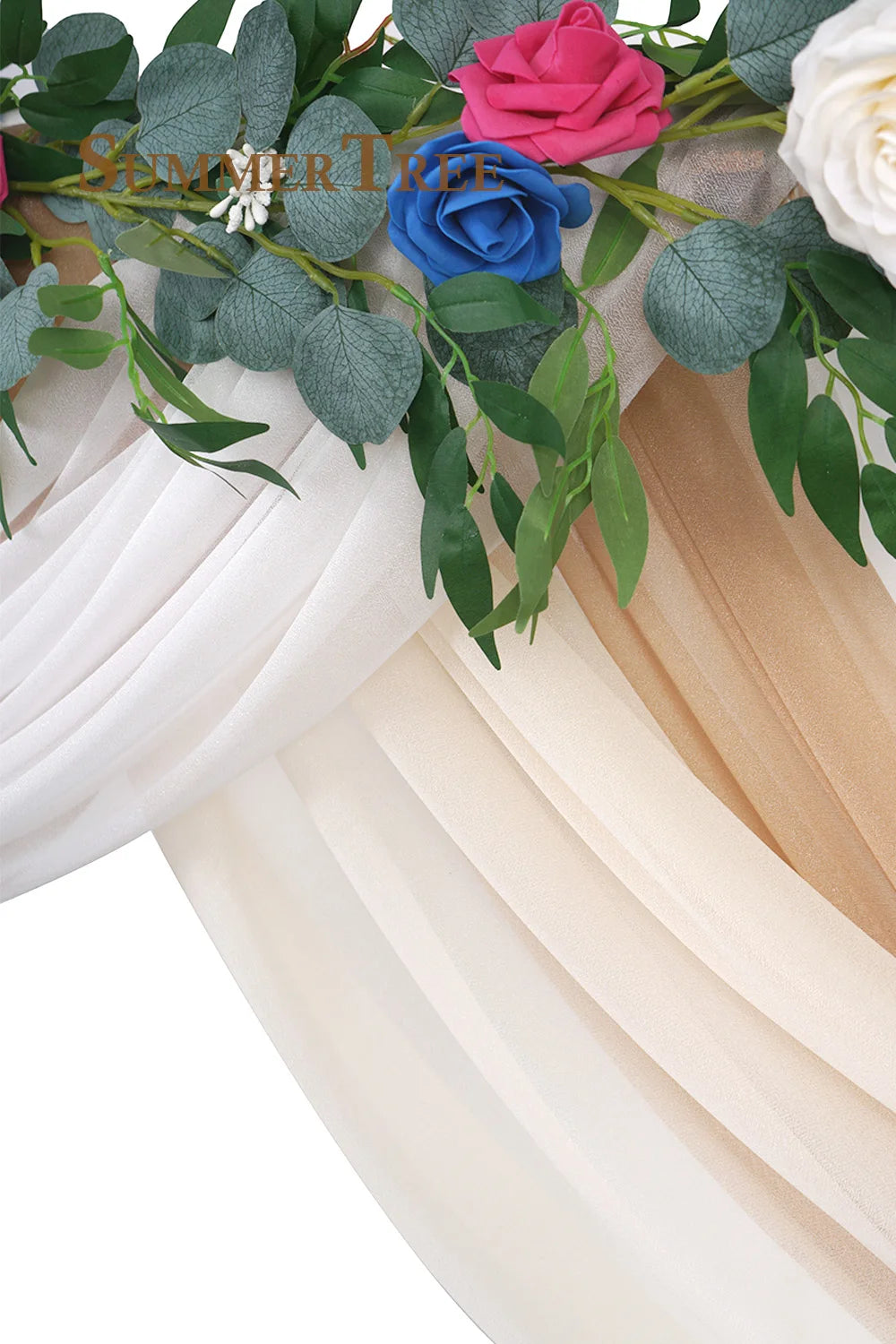 Elegant chiffon fabric in white and beige tones draped with green leaves and pink and blue roses for a wedding arch.