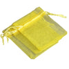 Yellow organza drawstring gift pouches stacked together.