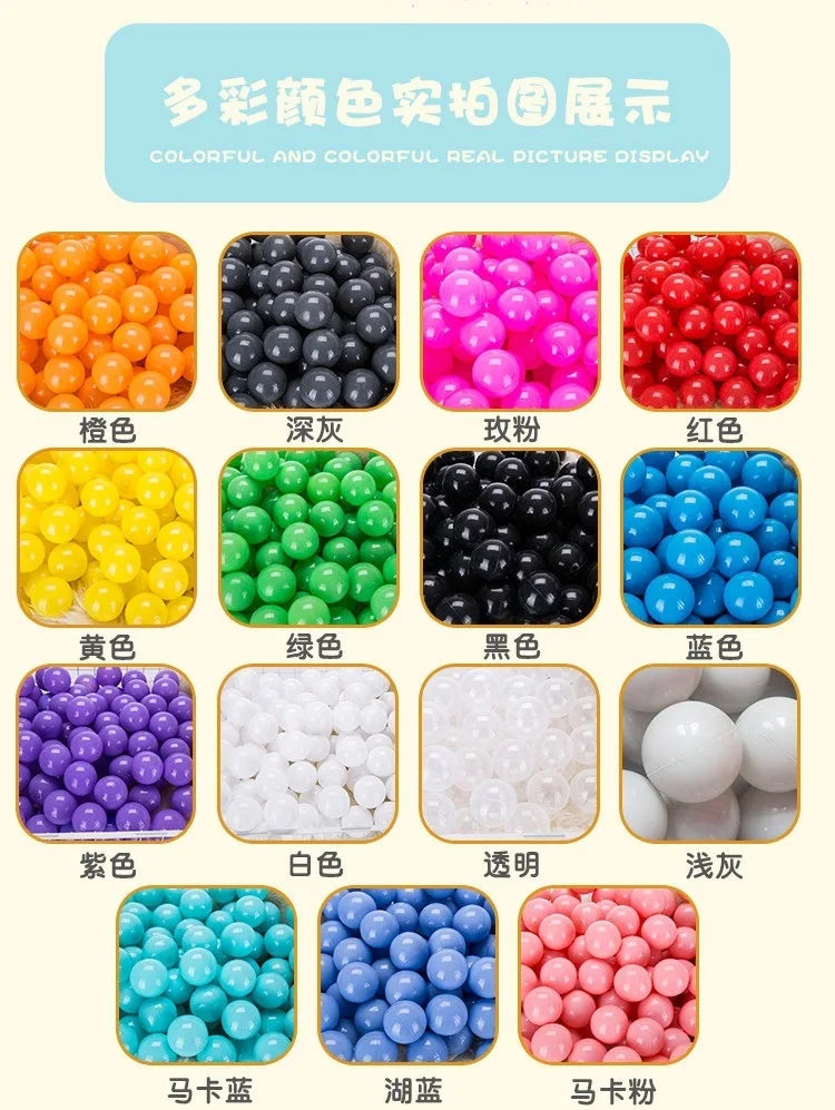 A display of various colorful and clear plastic balls including orange, black, pink, red, blue, yellow, green, purple, white,