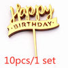 A set of ten gold acrylic happy birthday cake toppers with the words Happy Birthday