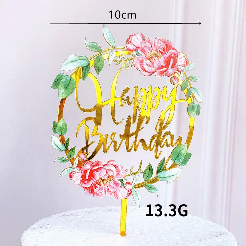 Rose gold acrylic happy birthday cake topper featuring pink roses and green leaves