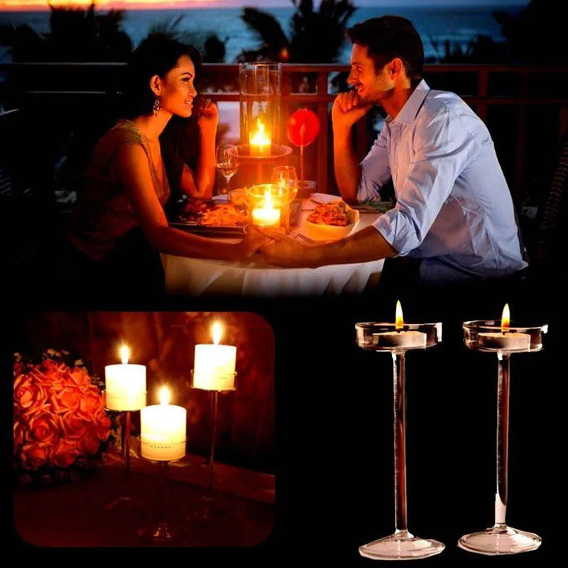 A couple enjoying a romantic evening with candlelight dinner, featuring elegant glass candle holders.