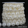 Ivory pearl bead garland featuring small spherical pearls packaged for wedding and event decoration.