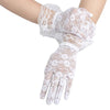 White sheer lace gloves worn on a hand, showing intricate floral patterns.