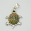 Silver pendant necklace featuring a polished, oval natural stone with green and reddish-brown mottled patterns.