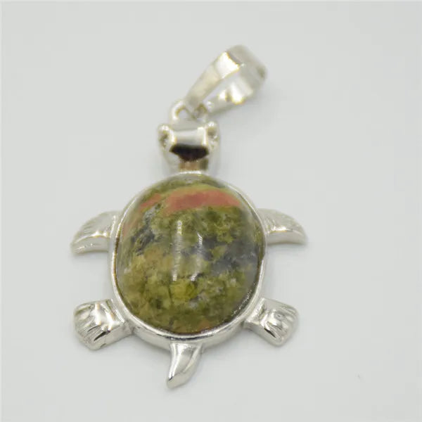 Silver pendant necklace featuring a polished, oval natural stone with green and reddish-brown mottled patterns.