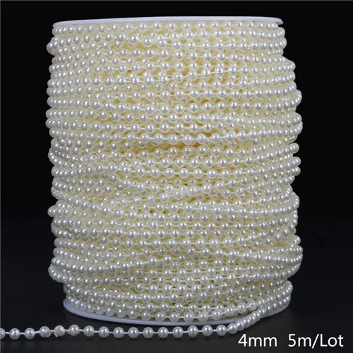 A spool of ivory pearl beads used for garlands and decoration.