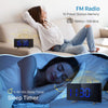 A projection alarm clock with a large LED display and FM radio is shown in use, featuring a sleep timer function.