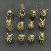 A collection of brass Chinese Zodiac animal statues, including a monkey, rabbit, and other zodiac animals.