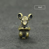 Brass statue of a rat with large ears, designed as an incense holder.