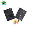Black foil zip bags filled with colorful candies and packaged for gifts
