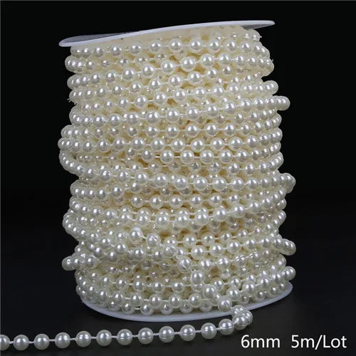 A spool of ivory pearl beads used for garland decoration, measuring 6mm in diameter and 5 meters long per lot.