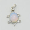 Silver pendant necklace featuring a polished, oval piece of light blue and pink natural stone shaped like an animal.