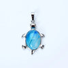 A silver pendant necklace featuring a polished blue-green natural stone shaped like an animal.