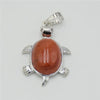 Silver pendant necklace featuring a polished, oval reddish-brown natural stone set in a bezel and suspended by a bail.