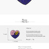 A purple heart-shaped enamel pin featuring a yellow skull design.